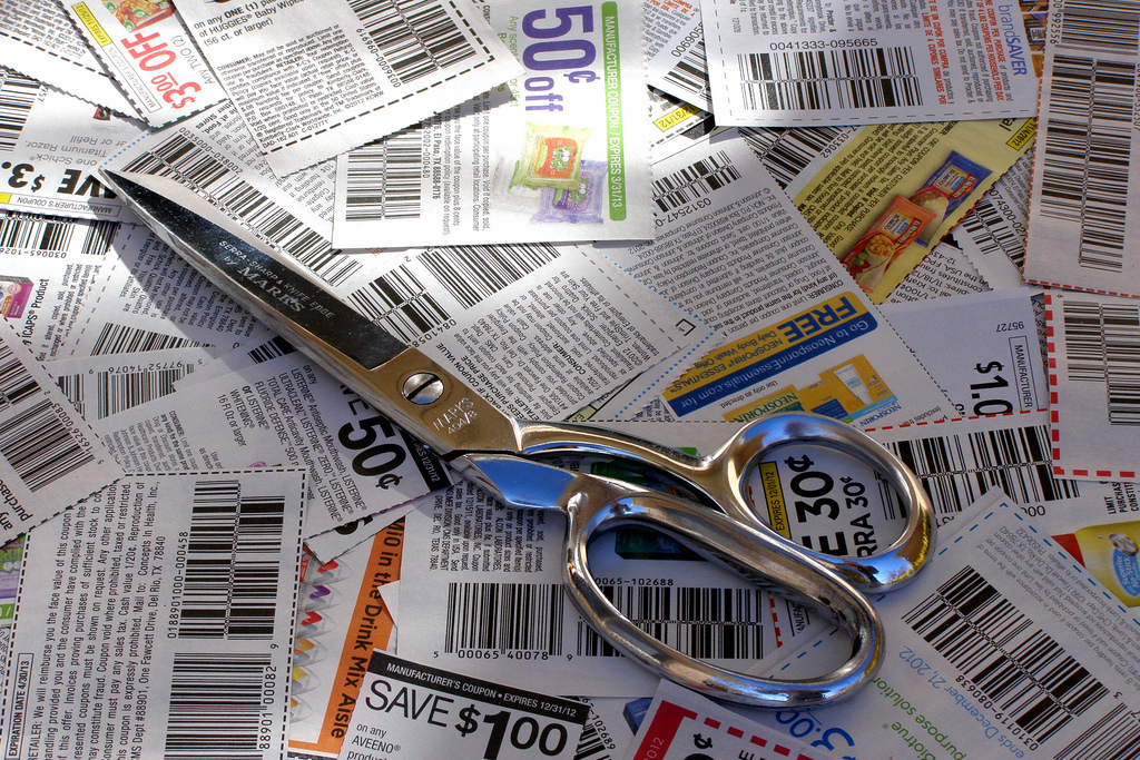 Clipped coupons with scissors