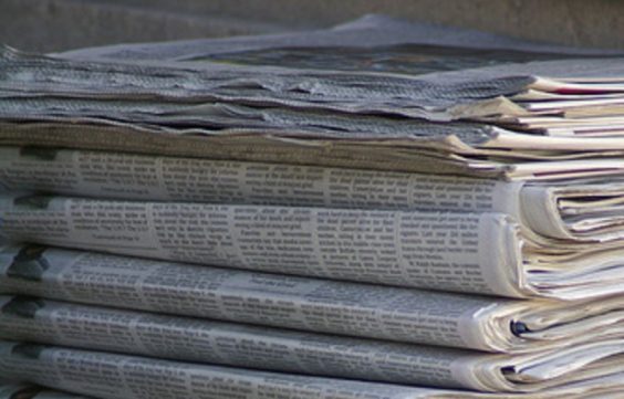 Newspapers pile